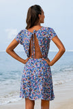 Robe courte dos nu bleue imprimé floral