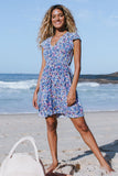 Robe courte dos nu bleue imprimé floral